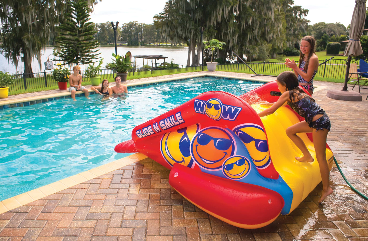 WOW Sports Slide N Smile Pool Inflatable Water Slide with Sprinklers